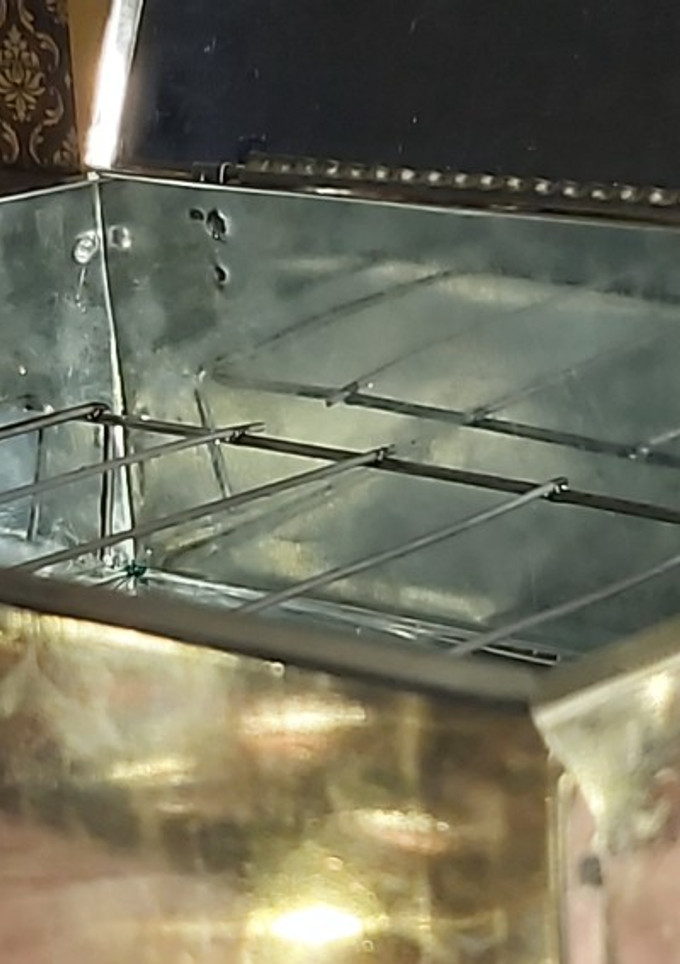 Una foto de Verduras y pollo al vapor en caja china casera