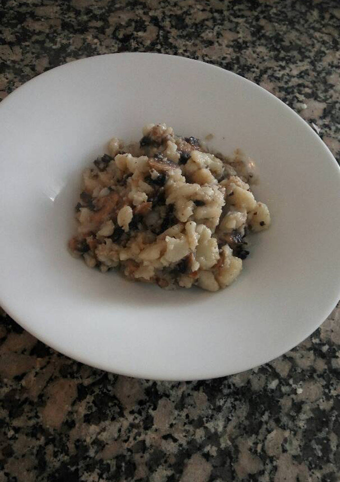 Una foto de Revuelto de coliflor y champiñones