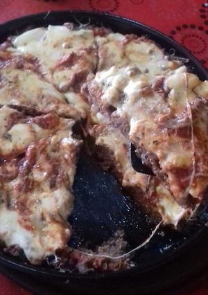 Una foto de Pizza de carne