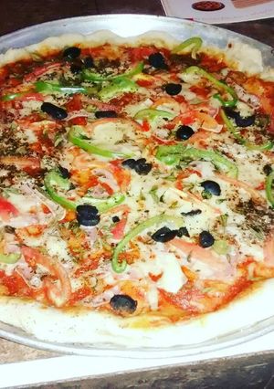 Una foto de Pizza clásica a la napolitana