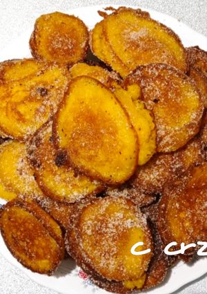 A picture of Pumpkin Fritters (Chulas or Buñuelos de Calabaza).