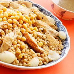 A picture of Semolina dough grains with chicken - moghrabieh.