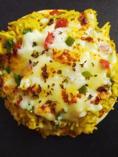 मिनी मैगी पिज़्ज़ा (Mini Maggi pizza recipe in Hindi) रेसिपी मुख्य फोटो