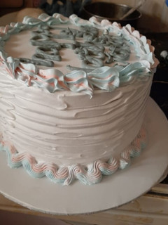 A picture of Flufy lemon rosemary cake,wid lemon cream cheese frosting recipe.