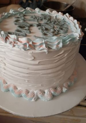 A picture of Flufy lemon rosemary cake,wid lemon cream cheese frosting recipe.