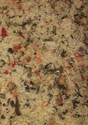 A picture of Fried rice with spring onions.