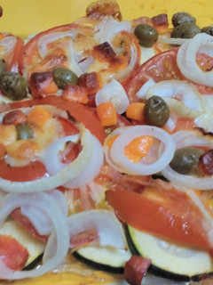Una foto de Calabacín al horno con tomate y queso