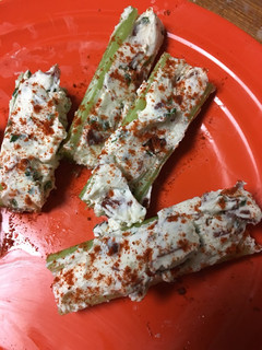 A picture of Bacon and chive stuffed celery sticks.