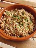 Cous cous con pies de cerdo y gambas