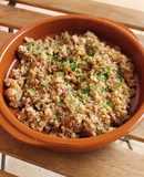 Cous cous con pies de cerdo y gambas