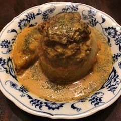 A picture of California Farm Stuffed Baked Onions.
