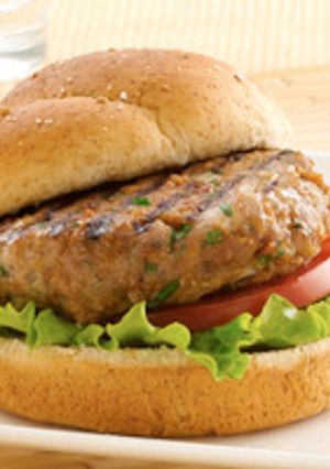 A picture of Asian-style Turkey Burgers with Baked Onion Rings.