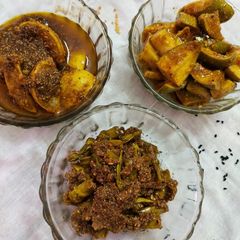 A picture of Raw mango, lemon and green chilli pickle.