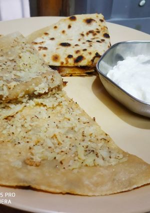 A picture of Cauliflower Paratha and Dahi.