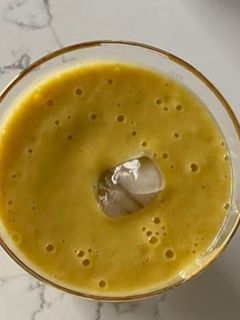 Foto de Sumo de Manga, Banana e Laranja