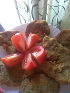 Una foto de Pollo empanado de tu hermano