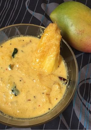 A picture of Mambazha pulissery (Sour and Sweet Mango curry).