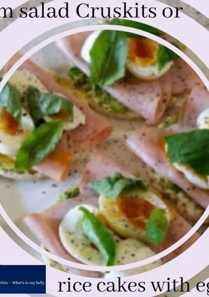 A picture of Ham salad Cruskits or rice cakes with eggs!.