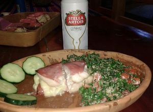 Una foto de Arrollados de gatuzo macerado y tabulle