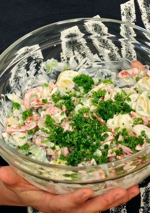 A picture of Potato salad with capsicum and cucumber.