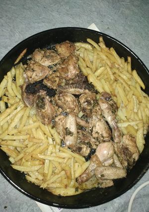 A picture of Oven Baked Chicken and fries.