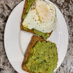 A picture of Avocado toast and 🥚.