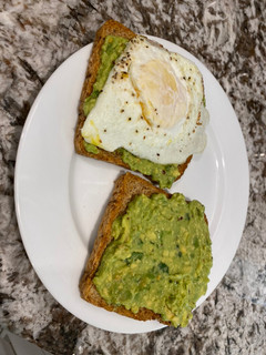 A picture of Avocado toast and 🥚.