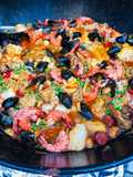Paella mixt auf dem Grill