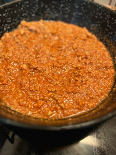 Una foto de Salsa boloñesa con chalotas y calabaza asada