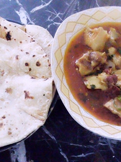 A picture of Beef paaye with Chapati.