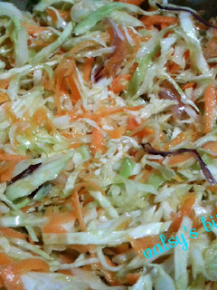 A picture of Carrots with cabbage.