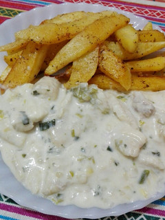 Una foto de Pescado con salsa de Queso crema y verdeo