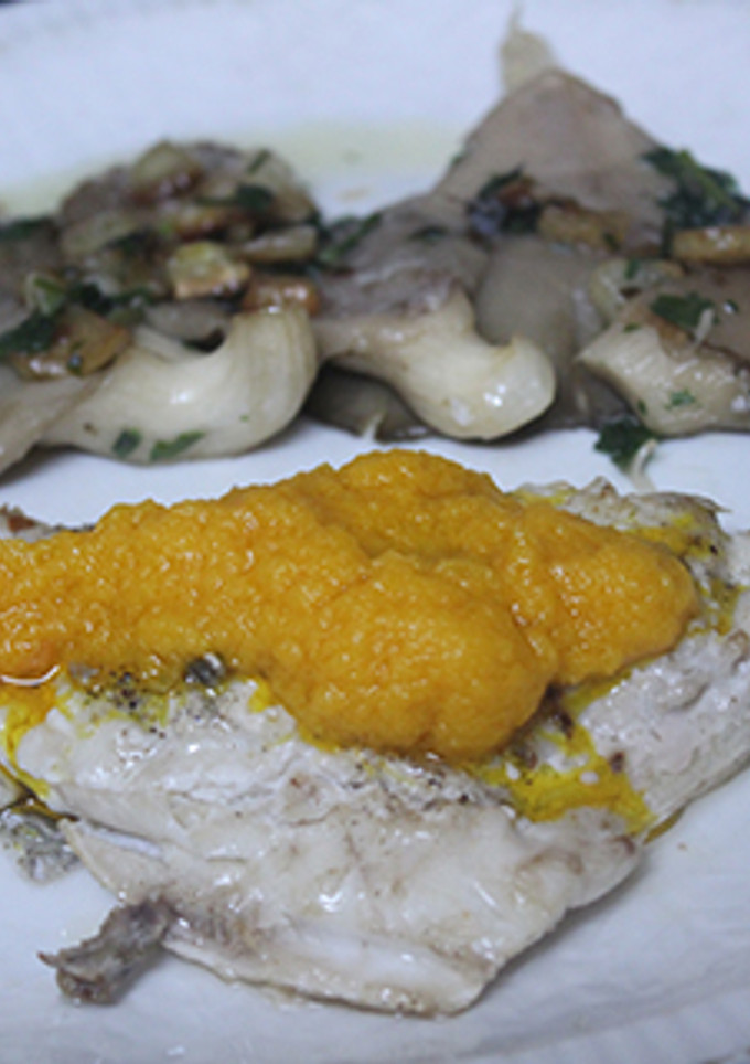 Una foto de Filete de dorada con setas