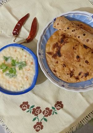 A picture of Paratha with raita.