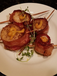 A picture of Grilled Scallops, Wrapped in Bacon.