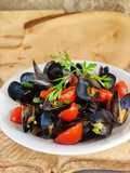 Cozze con pomodorini e prezzemolo