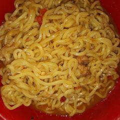 A picture of Seafood indomie with fish chunks.