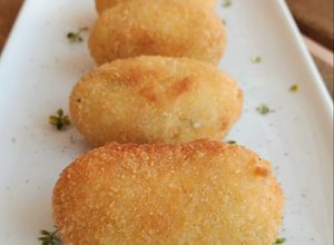 Foto principal de Croquetas de pollo a l'ast