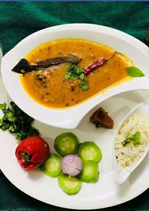A picture of Red & yellow lentils in kohlapuri gravy.