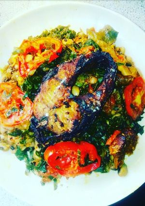 A picture of Porridge beans and vegetable with fried fish.