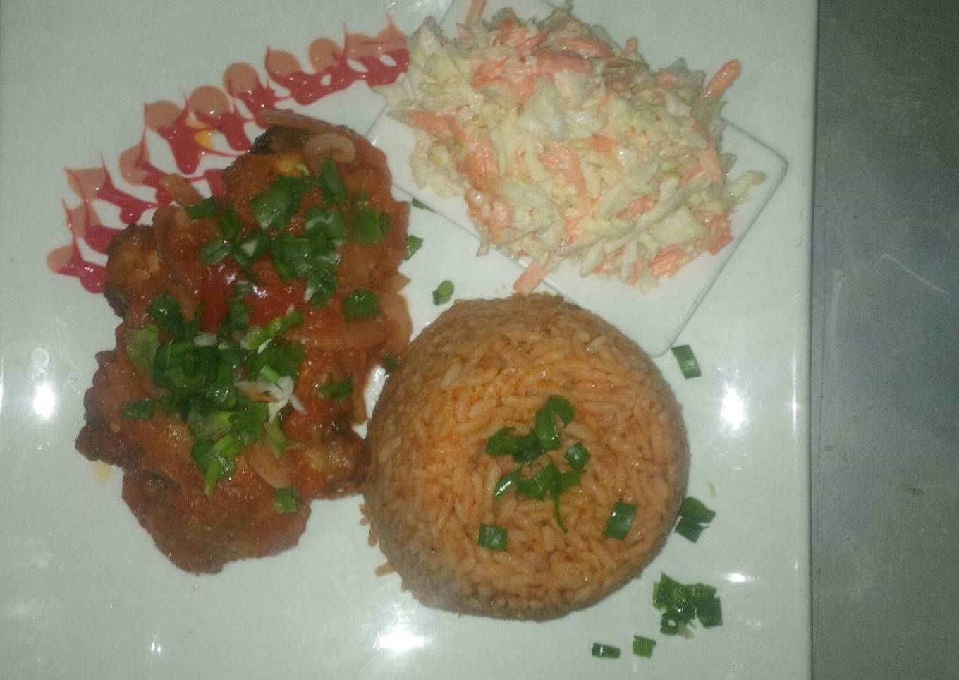 Jollof rice,coleslaw and chicken