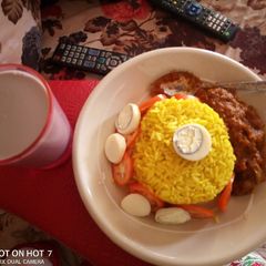 A picture of Miyar kayanciki da shinkafa Mai curry.