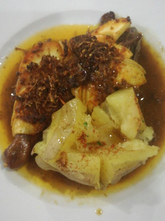 Una foto de Pato al horno con patata