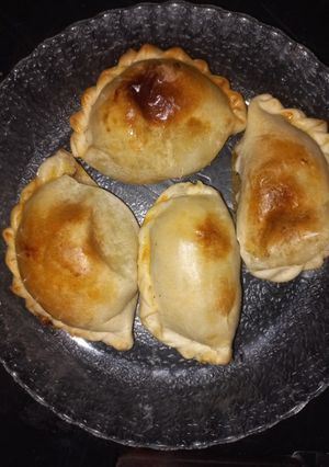 Una foto de Empanadas caseras de cebolla y queso