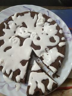 A picture of Cocoa Powder Cake With Fresh Cream.