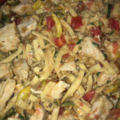 A picture of Veggie garden Parmesan chicken and pasta.