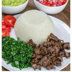 A picture of Ugali, beef, sukuma wiki.
