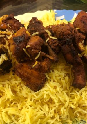 A picture of Chicken tikka mandi arabian recepi with saffron rice.
