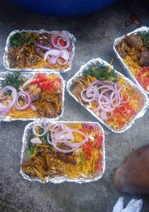 A picture of Abacha with fried fish.