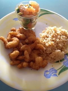 Una foto de Camarones apanados